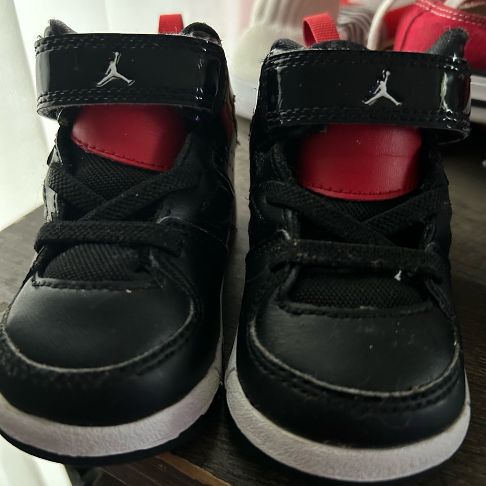Jordan’s, size 3c, color black and red